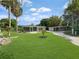 Two-unit property with spacious lawn, screened porches, and ample parking at 2112 Mark Ave, Punta Gorda, FL 33950