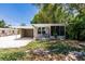 House exterior with carport and landscaping at 2112 Mark Ave, Punta Gorda, FL 33950