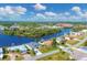 Bird's eye view of waterfront home and neighborhood at 430 Spring Lake Nw Blvd, Port Charlotte, FL 33952