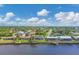 Wide view of waterfront homes and canal at 430 Spring Lake Nw Blvd, Port Charlotte, FL 33952