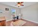 Bedroom showcasing hardwood floors, a ceiling fan, and a comfortable space at 98 Seasons Dr, Punta Gorda, FL 33983