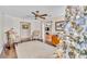 Inviting living room with hardwood floors, ceiling fan, and comfortable seating arrangement at 98 Seasons Dr, Punta Gorda, FL 33983