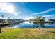 Scenic waterfront property with private canal access and lush landscaping at 1345 Mediterranean Dr # A102, Punta Gorda, FL 33950