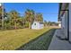 Backyard with shed and grassy area at 2387 Tamarind St, Port Charlotte, FL 33948