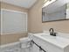 Clean bathroom with white vanity and marble flooring at 2387 Tamarind St, Port Charlotte, FL 33948