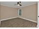 Spacious bedroom featuring wood-look flooring at 2387 Tamarind St, Port Charlotte, FL 33948