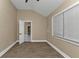 Bright bedroom with wood-look flooring and neutral walls at 2387 Tamarind St, Port Charlotte, FL 33948