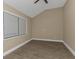 Spacious bedroom with wood-look floors and neutral walls at 2387 Tamarind St, Port Charlotte, FL 33948