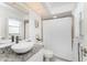 Bright bathroom with granite vanity, updated fixtures, and a shower/tub combo at 279 Mariner Ln, Rotonda West, FL 33947