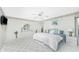 Main bedroom with king bed and ceiling fan at 279 Mariner Ln, Rotonda West, FL 33947