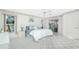 Main bedroom with king bed, and access to the pool at 279 Mariner Ln, Rotonda West, FL 33947