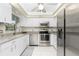 Modern kitchen with stainless steel appliances at 279 Mariner Ln, Rotonda West, FL 33947