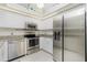 Modern kitchen with stainless steel appliances at 279 Mariner Ln, Rotonda West, FL 33947