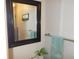 Bathroom with mirror and towel rack at 6603 Hauli Ct, North Port, FL 34287