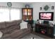 Bright living room with large windows and cozy seating at 6603 Hauli Ct, North Port, FL 34287
