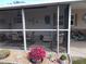 Relaxing screened porch with patio furniture, perfect for outdoor dining at 6603 Hauli Ct, North Port, FL 34287