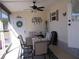Bright sunroom with table and chairs, perfect for dining at 6603 Hauli Ct, North Port, FL 34287