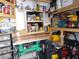 Workshop with various tools and shelving units at 6603 Hauli Ct, North Port, FL 34287