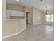 Dining area with tile floors and a view to the kitchen at 7146 Sablon Rd, North Port, FL 34291