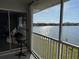 View from balcony overlooking lake at 3310 Loveland Blvd # 1408, Port Charlotte, FL 33980