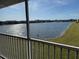 Stunning lake view seen from the screened in lanai at 3310 Loveland Blvd # 1408, Port Charlotte, FL 33980