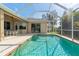 Inviting, screened pool with ample deck space at 219 White Marsh Ln, Rotonda West, FL 33947