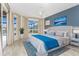 Spacious bedroom with water views and a sophisticated color scheme at 3911 Crooked Island Dr, Punta Gorda, FL 33950