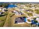 Aerial view showing home's location, pool, and surrounding landscape at 425 Orinoco St, Punta Gorda, FL 33983