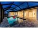 Inviting screened pool with a view of the home's interior at 425 Orinoco St, Punta Gorda, FL 33983