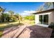 Backyard featuring a brick patio and beautiful lawn at 1190 Victoria Ave Nw, Port Charlotte, FL 33948