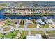 Wide view of waterfront home and surrounding neighborhood at 138 Peckham Sw St, Port Charlotte, FL 33952