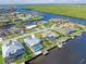 Expansive aerial showcasing waterfront property and canal at 138 Peckham Sw St, Port Charlotte, FL 33952