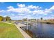 Private boat lift and dock on the canal at 138 Peckham Sw St, Port Charlotte, FL 33952