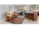 Cozy breakfast nook with wicker chairs and access to the patio at 138 Peckham Sw St, Port Charlotte, FL 33952