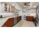 Renovated kitchen with stainless steel appliances and ample counter space at 138 Peckham Sw St, Port Charlotte, FL 33952
