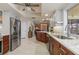 Modern kitchen with stainless steel appliances and granite countertops at 138 Peckham Sw St, Port Charlotte, FL 33952