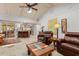 Open living room with kitchen view and island at 138 Peckham Sw St, Port Charlotte, FL 33952