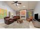 Relaxing living room featuring a fireplace and comfortable seating at 138 Peckham Sw St, Port Charlotte, FL 33952