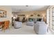 Spacious living room with comfortable seating and plenty of natural light at 138 Peckham Sw St, Port Charlotte, FL 33952