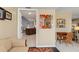 Home office with a view into the kitchen and a small work area at 138 Peckham Sw St, Port Charlotte, FL 33952
