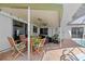 Outdoor dining and seating area near the pool at 138 Peckham Sw St, Port Charlotte, FL 33952