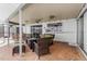 Covered patio with seating area overlooking the pool at 138 Peckham Sw St, Port Charlotte, FL 33952
