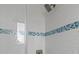 Shower with white subway tile and mosaic trim at 138 Peckham Sw St, Port Charlotte, FL 33952