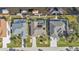 Birds eye view of multiple waterfront homes and canal at 18491 Hottelet Cir, Port Charlotte, FL 33948
