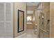 Bathroom with a soaking tub, shower, and a large mirror at 18491 Hottelet Cir, Port Charlotte, FL 33948