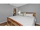 Main bedroom with a large bed and closet at 18491 Hottelet Cir, Port Charlotte, FL 33948