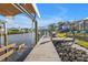 Spacious dock with boat lift and water access at 18491 Hottelet Cir, Port Charlotte, FL 33948