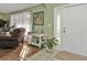 Bright entryway with tiled floor and interior door at 18491 Hottelet Cir, Port Charlotte, FL 33948