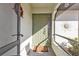 Front entrance with a green door and welcome mat at 18491 Hottelet Cir, Port Charlotte, FL 33948