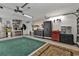 Organized garage with ample storage and work area at 18491 Hottelet Cir, Port Charlotte, FL 33948